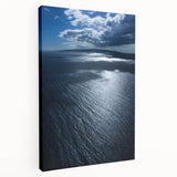 Stretched canvas wall art showcasing a serene beach landscape with vibrant colors and intricate details, perfect for home decor and coastal themes.