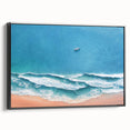 Framed canvas wall art showcasing a serene beach landscape, featuring vibrant colors and a black frame, perfect for enhancing modern home décor.