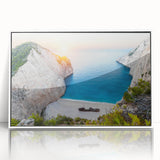 Framed acrylic wall art featuring a serene beach landscape with soft pastel colors and calming waves, perfect for enhancing any coastal-themed decor.