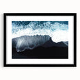 Framed black wall art showcasing a serene beach landscape, featuring vibrant blue skies and gentle waves, perfect for coastal-themed decor.