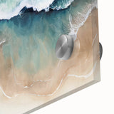 Close-up of a vibrant acrylic glass wall art piece showcasing a serene beach landscape with soft pastel colors, perfect for coastal home decor.