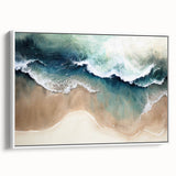 Framed canvas wall art showcasing a serene beach landscape with vibrant colors and gentle waves, displayed against a white backdrop for a modern aesthetic.