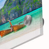 Close-up of a vibrant acrylic glass print showcasing a serene beach landscape with soft waves and golden sand, perfect for coastal-themed decor in modern interiors.