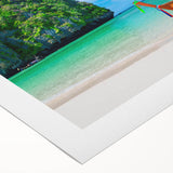 Vibrant rolled canvas wall art depicting a serene beach landscape at sunset, showcasing warm hues of orange and pink, perfect for home decor and relaxation.