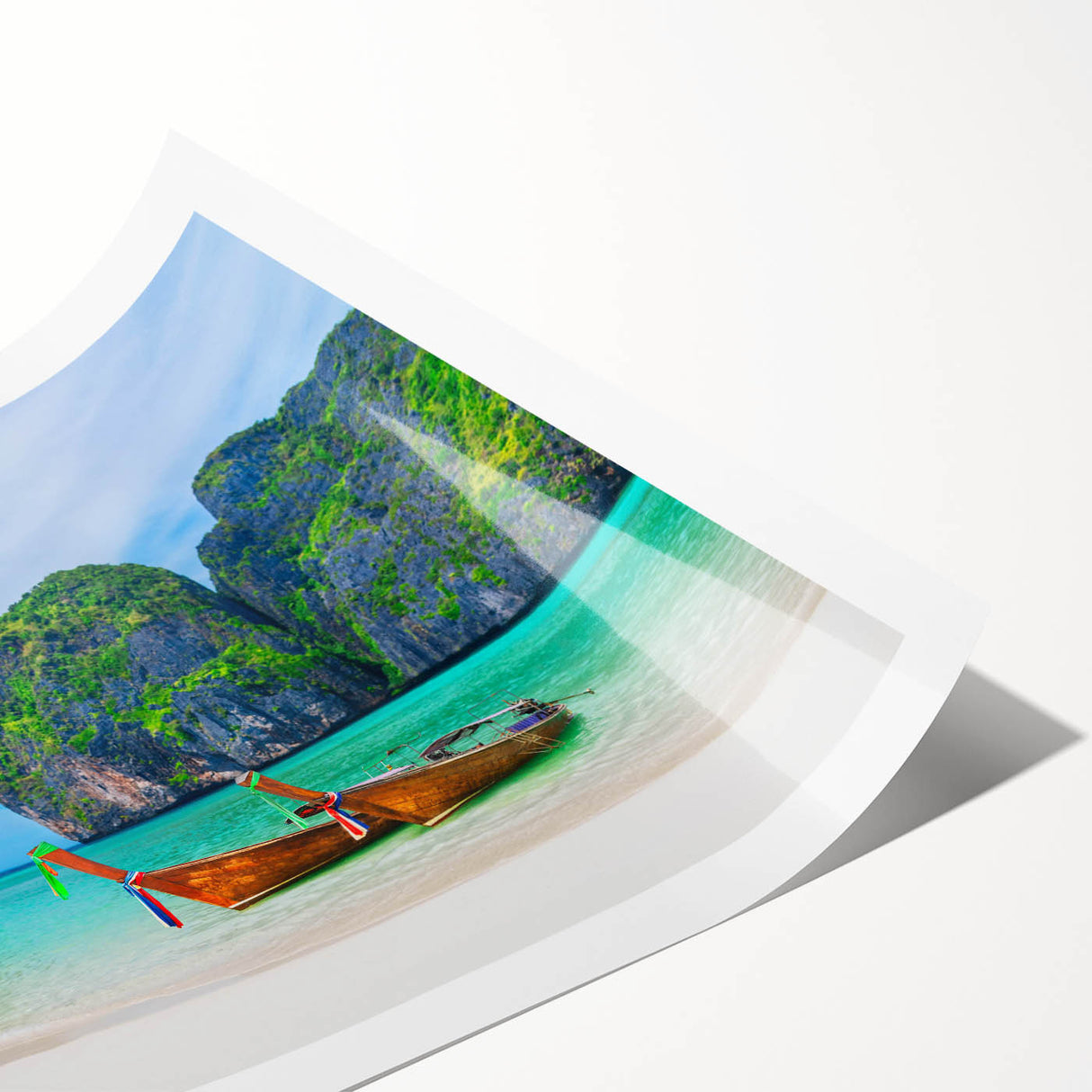 A vibrant landscape beach wall art print featuring serene ocean waves, golden sand, and a clear blue sky, rolled and ready for framing, perfect for home decor.