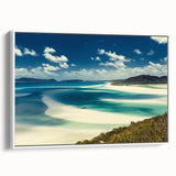 Framed canvas wall art showcasing a vibrant beach landscape design with soft waves and blue skies, presented in a sleek white frame, perfect for coastal decor.