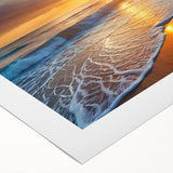Vibrant rolled canvas wall art showcasing a serene beach landscape with soft waves and a sunset sky, ideal for home decor and relaxation themes.