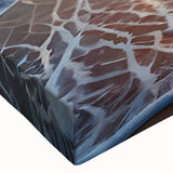 Close-up of a stretched canvas featuring a vibrant beach landscape design with soft blues and sandy tones, ideal for home decor, evoking tranquility and relaxation.