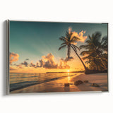 Framed canvas wall art showcasing a serene beach landscape with soft waves and a vibrant sunset, featuring a sleek silver frame that enhances its elegance. Perfect for coastal decor.