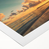 Vibrant rolled canvas wall art showcasing a serene beach landscape, featuring soft pastel colors and gentle waves, ideal for home decor enhancement.
