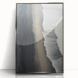 Framed acrylic wall art featuring a serene beach landscape design, showcasing soft blue ocean waves and sandy shores, ideal for coastal-themed decor.