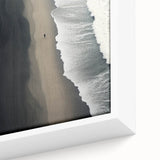 Framed canvas wall art showcasing a vibrant beach landscape with azure waters, golden sands, and a serene sky, perfect for enhancing coastal-themed decor.