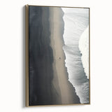 Framed canvas wall art showcasing a serene beach landscape with golden hues, elegantly displayed in a stylish frame, perfect for home decor enhancement.