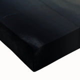 Close-up of a stretched canvas wall art piece showcasing a vibrant beach landscape design, featuring rich colors and intricate details, perfect for home decor.