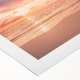 Rolled canvas art showcasing a serene beach landscape with vibrant colors, perfect for home decor, packaged securely in a protective cardboard tube.