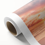 Vibrant rolled canvas artwork depicting a serene beach landscape, showcasing soft pastel colors and gentle waves, ideal for coastal decor and relaxation themes.