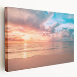 Stretched canvas wall art showcasing a vibrant beach landscape design, featuring calming blue ocean waves, golden sand, and palm trees, perfect for coastal decor.
