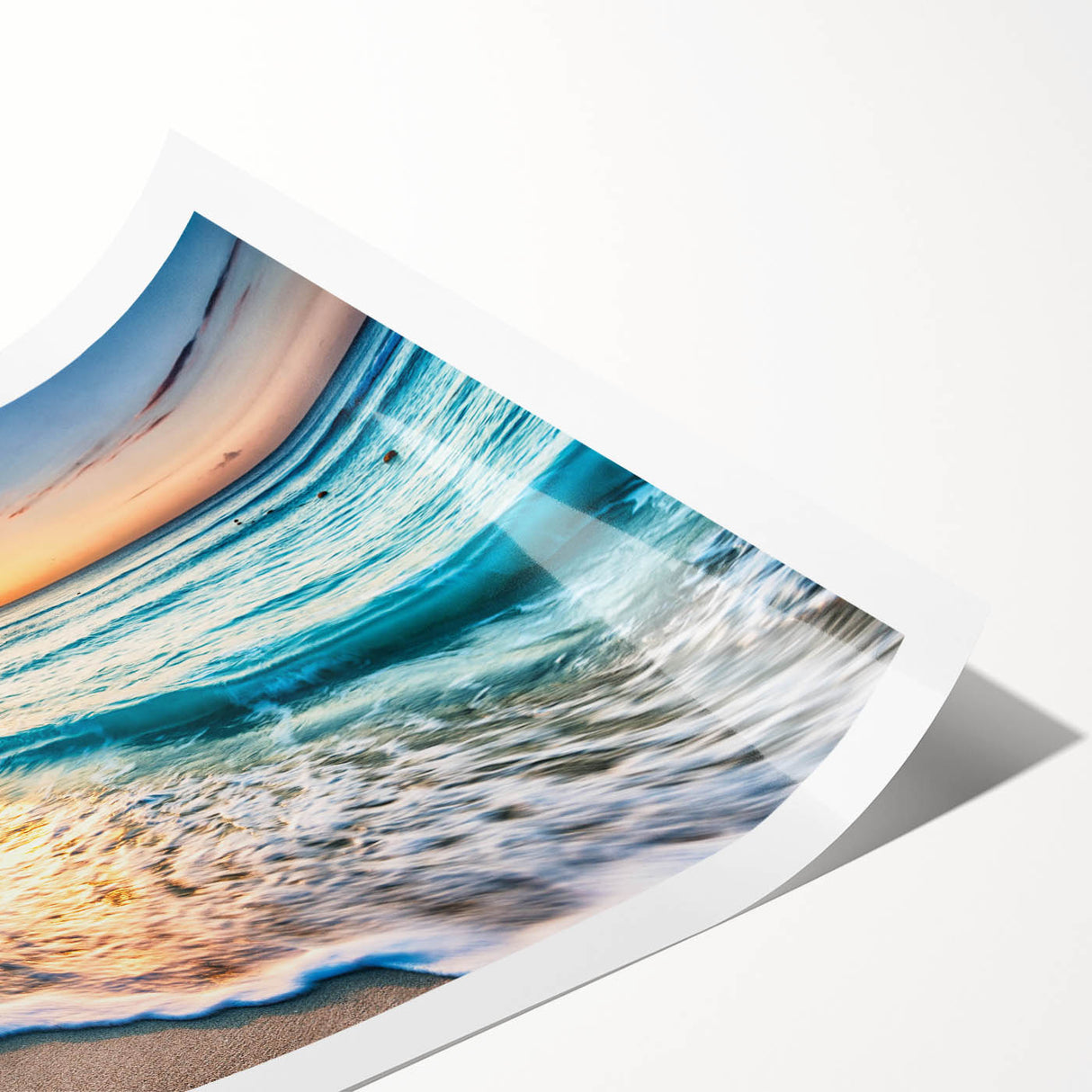 Vibrant beach landscape wall art print showcasing a serene sunset over waves, rolled for easy display and shipping, ideal for home decor enthusiasts.