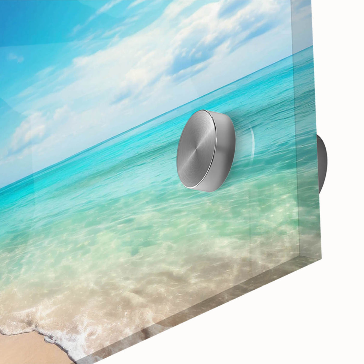 Vibrant close-up of an acrylic glass wall art piece showcasing a serene beach landscape with soft waves and a clear blue sky, perfect for coastal home decor.
