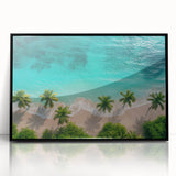 Framed acrylic wall art depicting a serene beach landscape with vibrant colors, showcasing gentle waves and a clear blue sky, perfect for home decor.