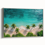 Framed canvas wall art showcasing a serene beach landscape with soft blue and gold tones, perfect for coastal-themed home decor. The artwork is elegantly framed in silver, enhancing its aesthetic appeal.