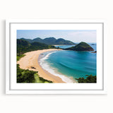 Framed wall art showcasing a serene beach landscape with soft waves and a clear blue sky, featuring a white mat and sleek frame, perfect for home decor.