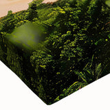 Close-up of a stretched canvas wall art piece showcasing a vibrant beach landscape design, featuring soft blue skies and golden sands, perfect for coastal decor.