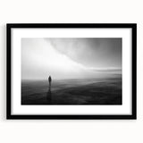 Framed black wall art featuring a serene beach landscape design, showcasing soft blue waves and sandy shores, perfect for home decor enhancement.