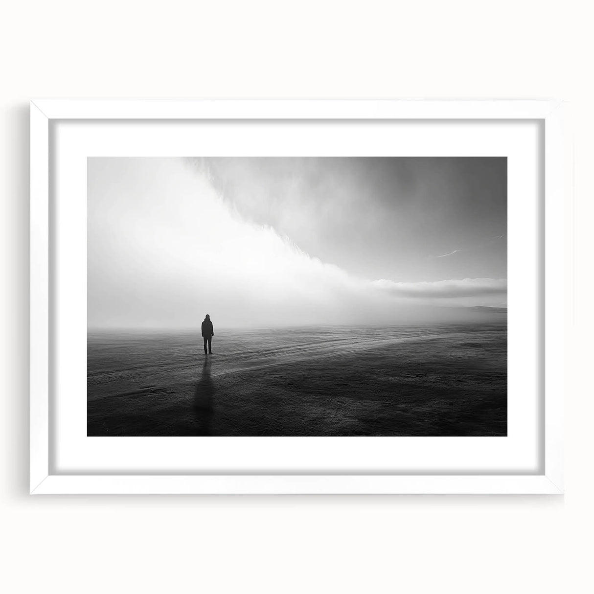 Elegant white-framed wall art featuring a serene beach landscape, showcasing soft sand and gentle waves, perfect for enhancing coastal-themed interiors.