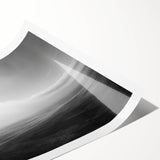 Rolled print of a serene beach landscape showcasing soft waves and golden sand, ideal for home decor, packaged securely in a durable tube for protection.