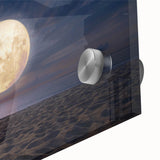 Close-up view of a vibrant acrylic glass wall art piece showcasing a serene beach landscape, featuring soft blue and sandy tones, ideal for interior decor.