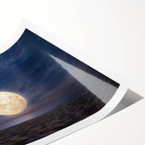 Rolled beach-themed wall art print showcasing vibrant ocean waves and sandy shores, elegantly packaged in a protective cardboard tube for easy display.