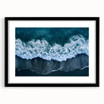 Framed black wall art featuring a serene beach landscape design, showcasing soft waves and a vibrant sunset, ideal for home décor and relaxation themes.