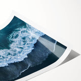 Rolled print showcasing a serene beach landscape with vibrant colors and gentle waves, ideal for home decor or office spaces, emphasizing tranquility and nature's beauty.