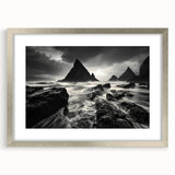 Framed wall art featuring a serene beach landscape with soft waves and a clear blue sky, showcasing a silver frame and mat for an elegant display. Perfect for coastal home decor.