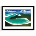 Framed wall art showcasing a serene beach landscape with vibrant colors, featuring a sleek black frame and matting, perfect for modern home decor.