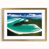 Framed wall art featuring a serene beach landscape with soft waves and golden hues, set in an elegant gold frame with a white mat, perfect for home decor.