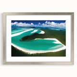 Framed landscape wall art featuring a serene beach scene with soft waves and a pastel sky. The silver frame enhances the artwork's elegance, perfect for home decor.