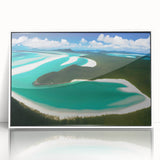 Framed acrylic wall art featuring a serene beach landscape with vibrant colors, ideal for home decor. The white frame enhances the coastal design, creating a calming atmosphere.