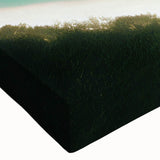 Close-up of a stretched canvas wall art piece depicting a serene beach landscape with vibrant colors, ideal for home decor and interior design enhancement.