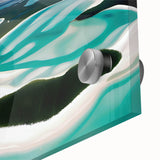 Close-up of a vibrant acrylic glass wall art piece showcasing a serene beach landscape, featuring vivid blues and sandy tones, perfect for coastal decor enthusiasts.