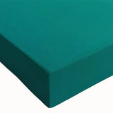 Close-up view of a stretched canvas artwork showcasing a vibrant beach landscape with soft waves and a colorful sunset, perfect for home decor.