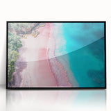 Framed wall art featuring a serene beach landscape with vibrant colors, presented in a sleek black frame, perfect for enhancing modern home decor.