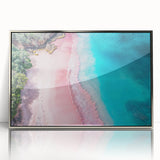 Framed acrylic wall art showcasing a serene beach landscape with soft blue and sandy tones, ideal for coastal home decor or relaxation spaces. The artwork captures the tranquility of nature, enhancing any room's ambiance.