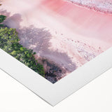 Rolled canvas wall art showcasing a serene beach landscape with vibrant blue waters and golden sand, perfect for coastal decor, packaged securely in a tube.