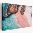 Stretched canvas wall art showcasing a serene beach landscape with vibrant blue waters and soft golden sand, ideal for coastal-themed home decor.