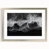 Framed wall art featuring a serene beach landscape design with soft pastel colors, encased in a sleek silver frame with a mat, ideal for home decor.