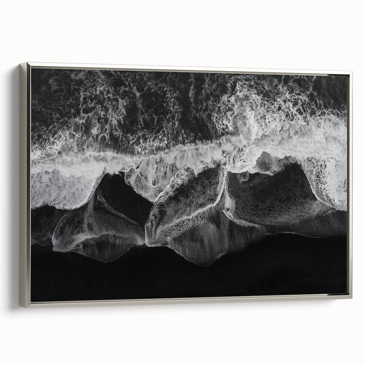 Framed canvas wall art showcasing a serene beach landscape with vibrant colors, featuring a silver frame and a side view highlighting its elegant design, perfect for home decor.
