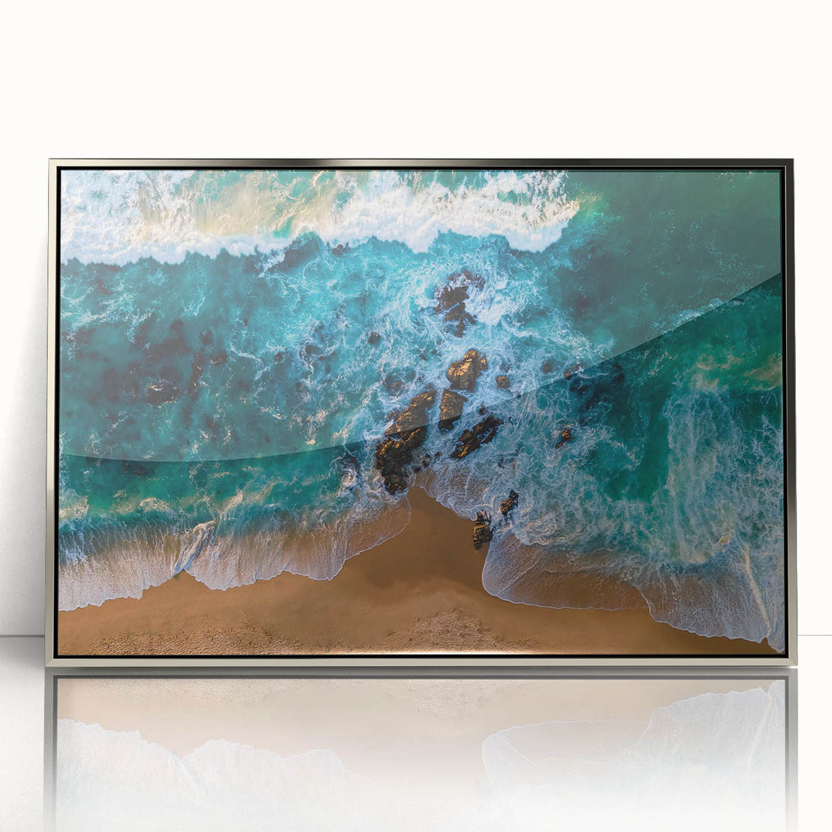 Framed acrylic wall art collection showcasing a serene beach landscape design with vibrant colors, presented in a sleek silver frame for modern decor.