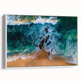 Framed canvas wall art showcasing a serene beach landscape, highlighted by soft white hues and natural textures, perfect for home decor and coastal themes.